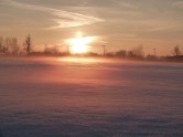 Winterlicher Sonnenuntergang üder dem Schnee (c) Frank Koebsch
