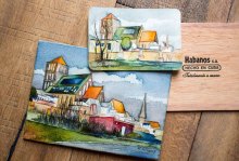 Aquarelle von der Rostocker Nikolaikirche auf einem Zigarrenkistenbrett und als Aquarellpostkarte (c) Frank Koebsch